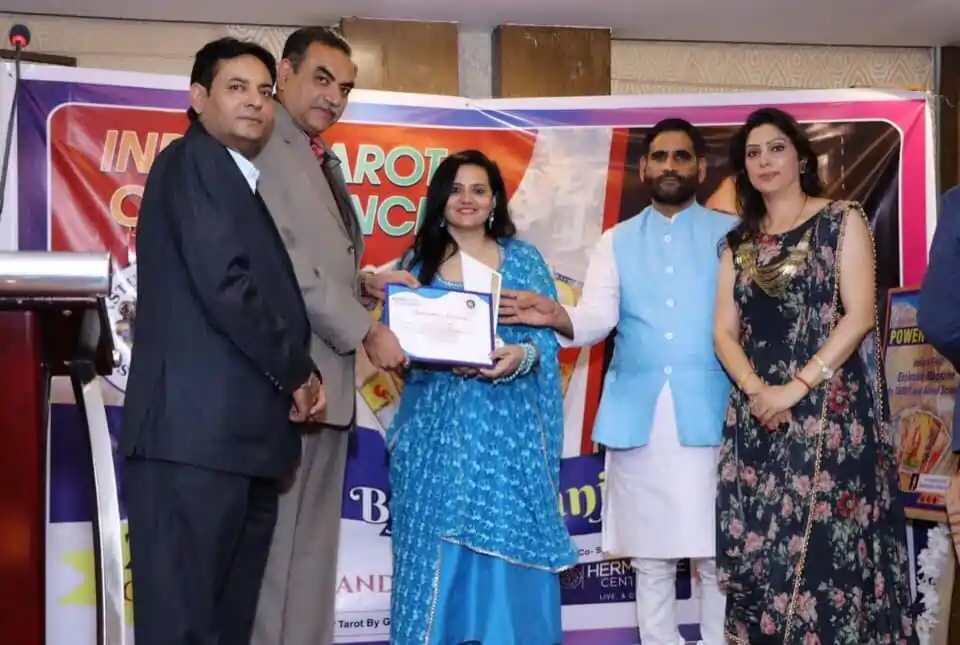 Soniya Sharma on stage at a business conference